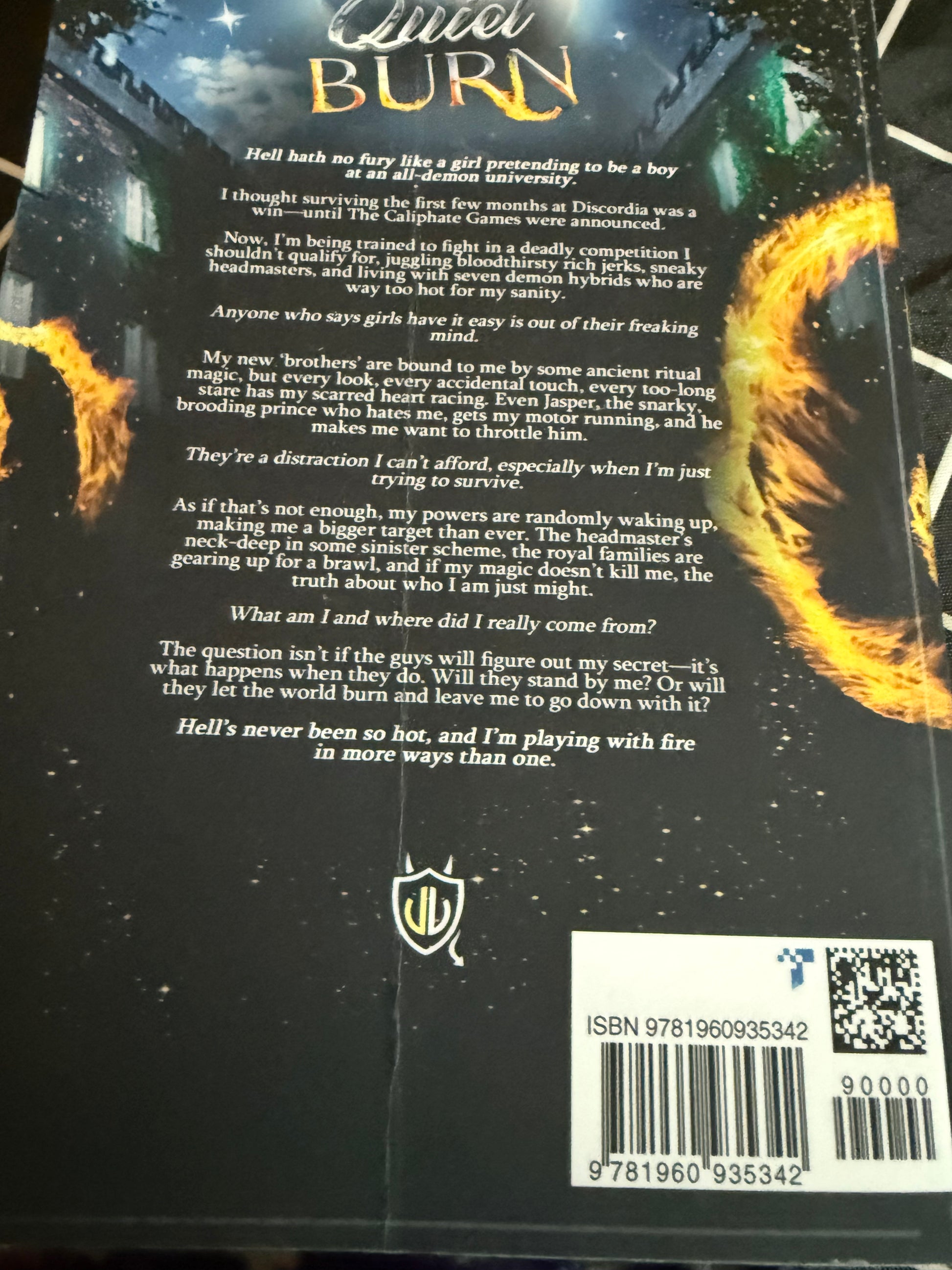 DAMAGED-Quiet Burn: A Reverse Harem Demon Academy Romance This book is non-returnable as it is being sold as damaged. The damage isa bent back cover. *** Hell hath no fury like a girl pretending to be a boy at an all-demon university. I thought surviving